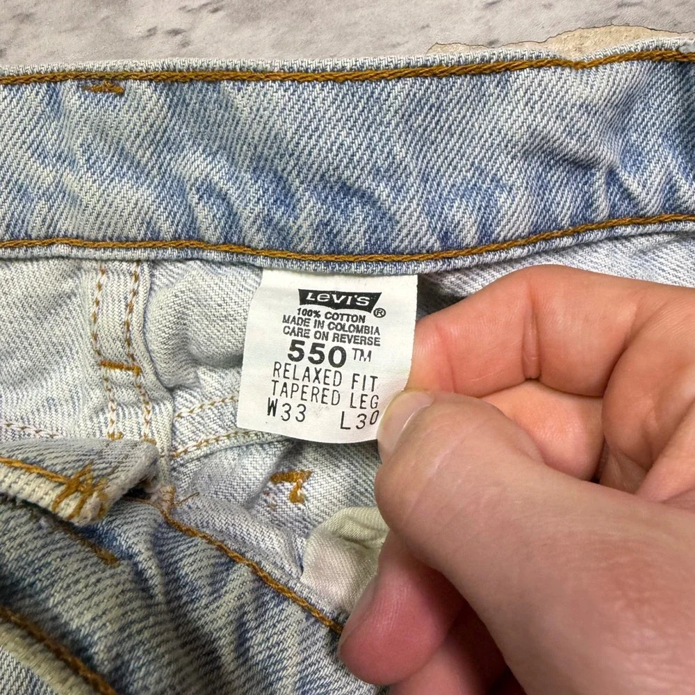 Vintage Levis 550 Orange Tab Relaxed Fit Tapered Leg Light Wash Jeans 33x30